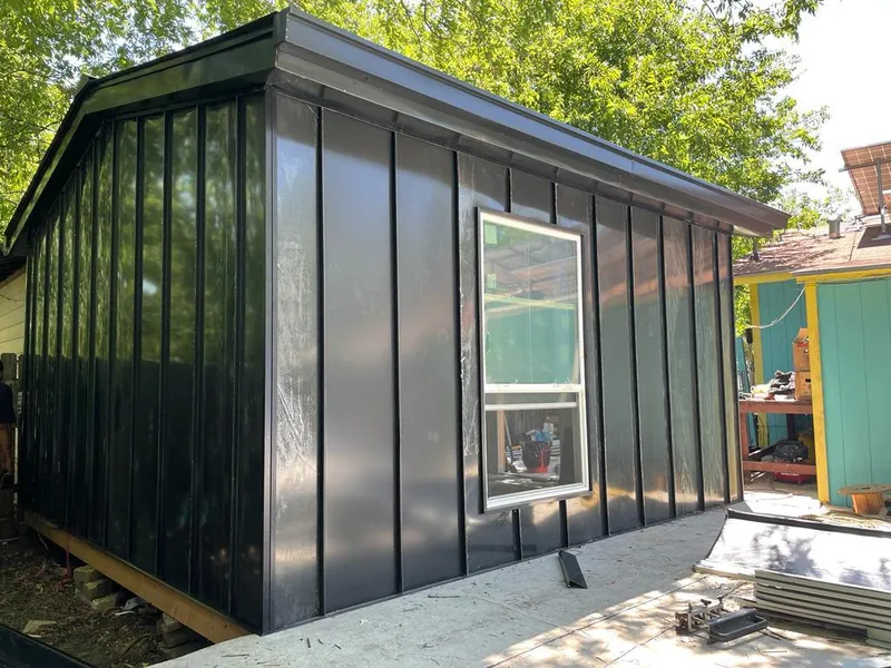 Black standing seam metal wall panels for Roof Inspection in Dublin